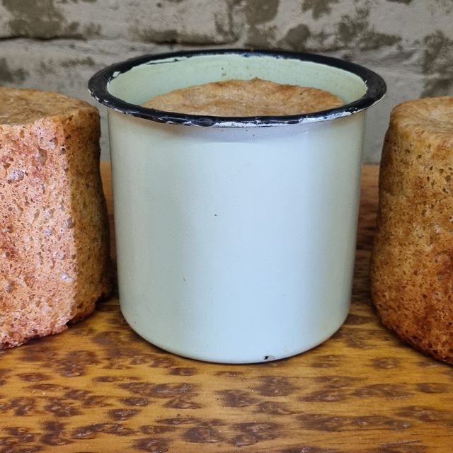 Sourdough loaves baked in enamel mugs