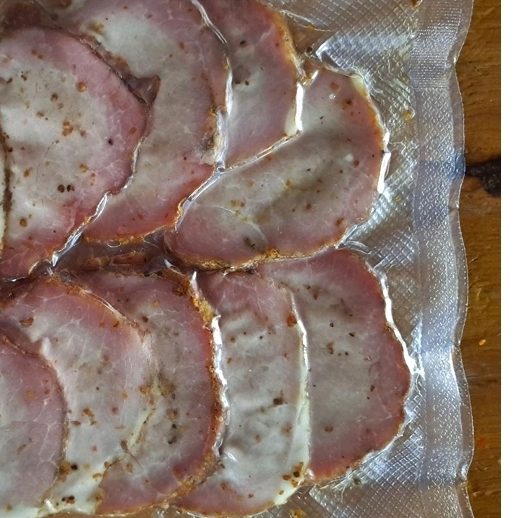 Slices of wood-fired smoked ham
